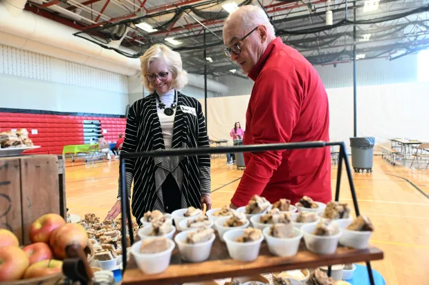 Jean and Tom McHugh of Boyertown check out the entries in the Kid's Celebrity Chef Competition during Boyertown's 19th Annual Wellness Fair on Saturday, March 14, 2026 at Boyertown Area High School.