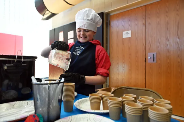 Eliana Bradley, 10, a fifth-grader at Colebrookdale Elementary, hands out Ellie's Kitchen Easy Vegan Potato Soup during the 19th annual Boyertown Health Fair Saturday, March 14, at Boyertown Area High School.