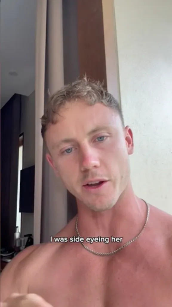 A man with gray hair and blue eyes, wearing a silver chain, looks at the camera with text. "I was looking forward to her" Covered