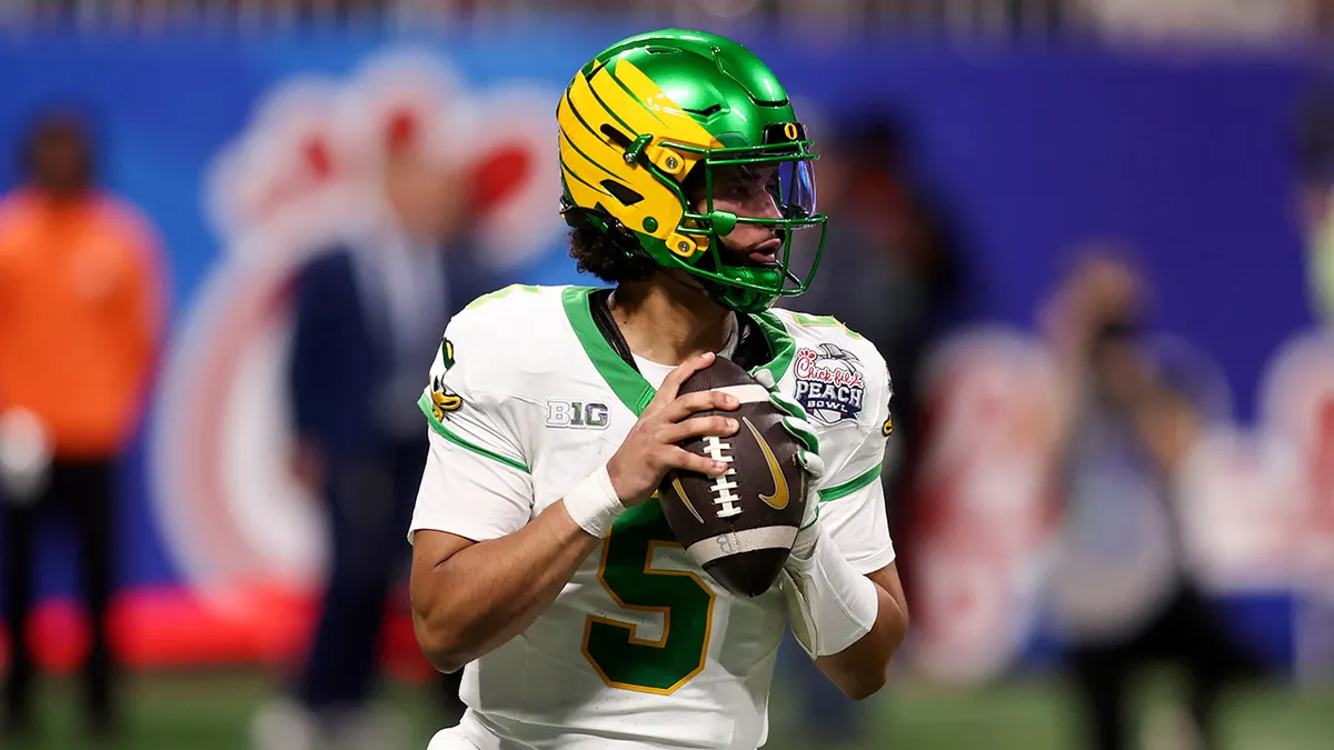 Dante Moore is looking for a throw