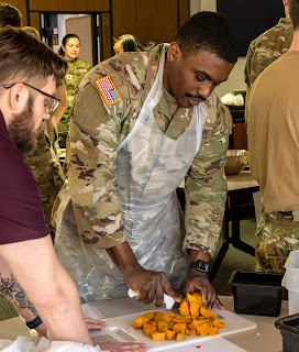 Academic students participate in hands-on clinical medicine practice as part of the Uniformed Services University's nationally recognized medical nutrition curriculum. USU's culinary lab integrates practical skills with clinical knowledge to improve the ability of future military physicians to optimize warfighter health, performance and readiness through nutrition. (Photo by Thomas Balfour)