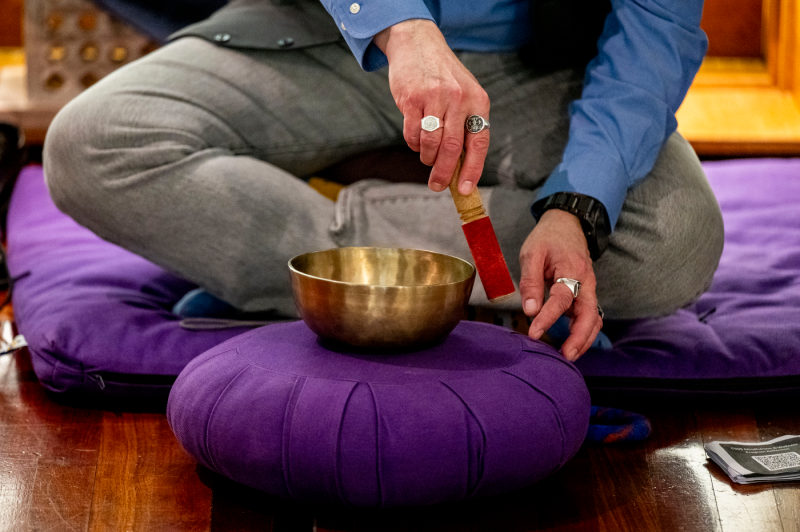 A man uses a sound bag during a meditation session at Northeastern University.