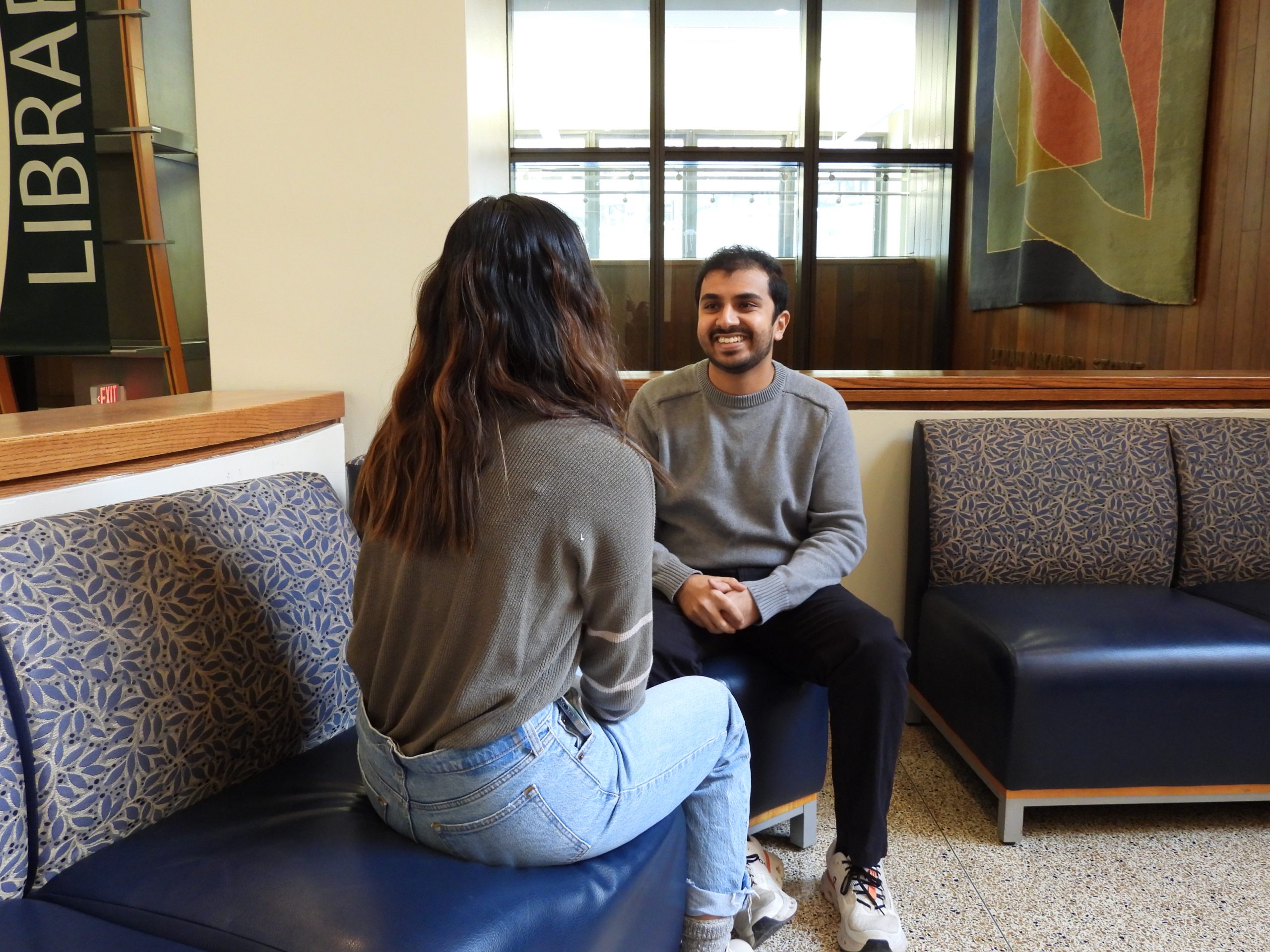 Parth Patel, SOM Class of 2026, with a classmate.